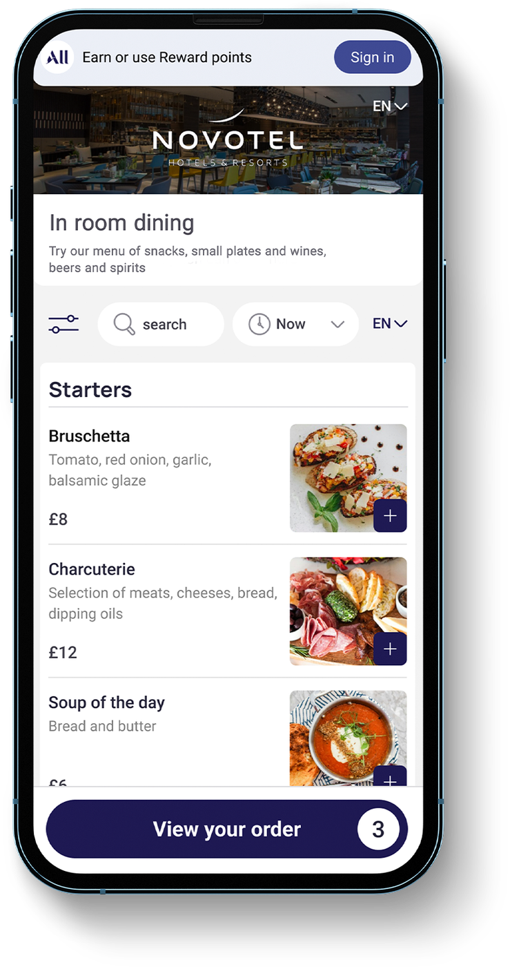 FETCH in-room dining menu shown on a mobile phone